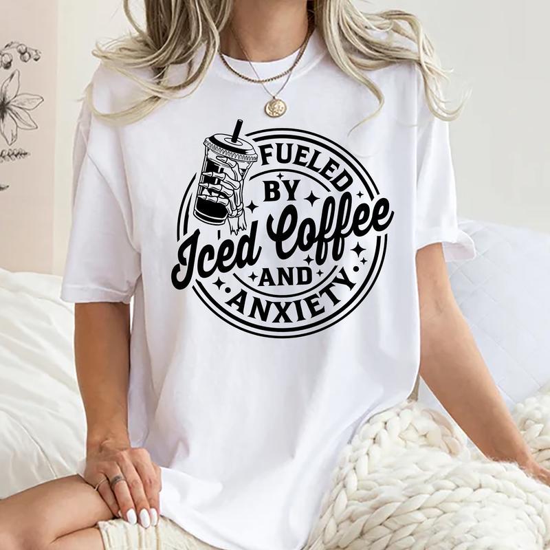 Fueled By Iced Coffee And Anxiety Shirt, Iced Coffee T-shirt, Inspired Caffeine-Powered Tee, Anxiety Graphic Printed Short Sleeve T-shirt, Cotton Fabric Comfort Shirt For Women, Women’s Tops, Womenswear Cotton Fabric Relaxed Fit Chic Style, gift for her