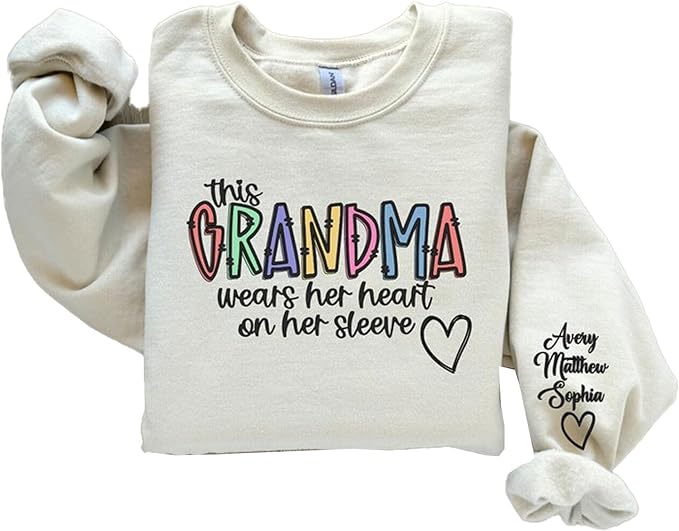 Personalized This Grandma Wears Her Heart On Her Sleeve Sweatshirt, Custom Sweater Grandma With GrandKids Names On Sleeve